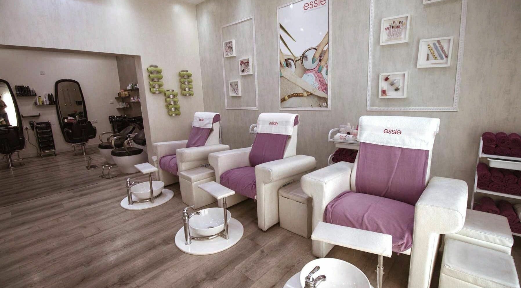 Luxurious pedicure chairs at Chique Ladies Beauty And Spa Center, Dubai, Dubai, AE with modern decor.