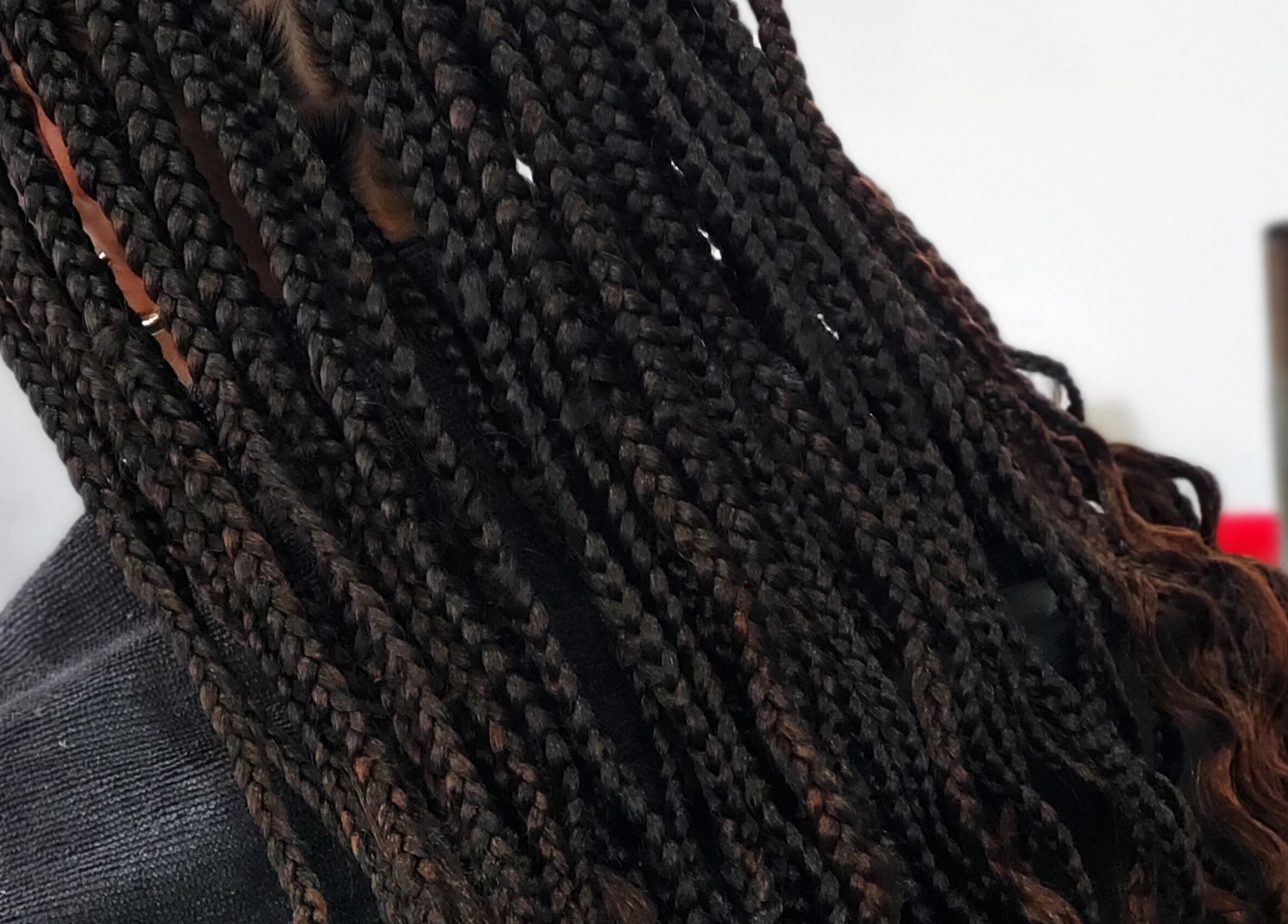 Intricate braids hairstyle at The Finished Look Castries, located in Castries, St.Lucia, JM.