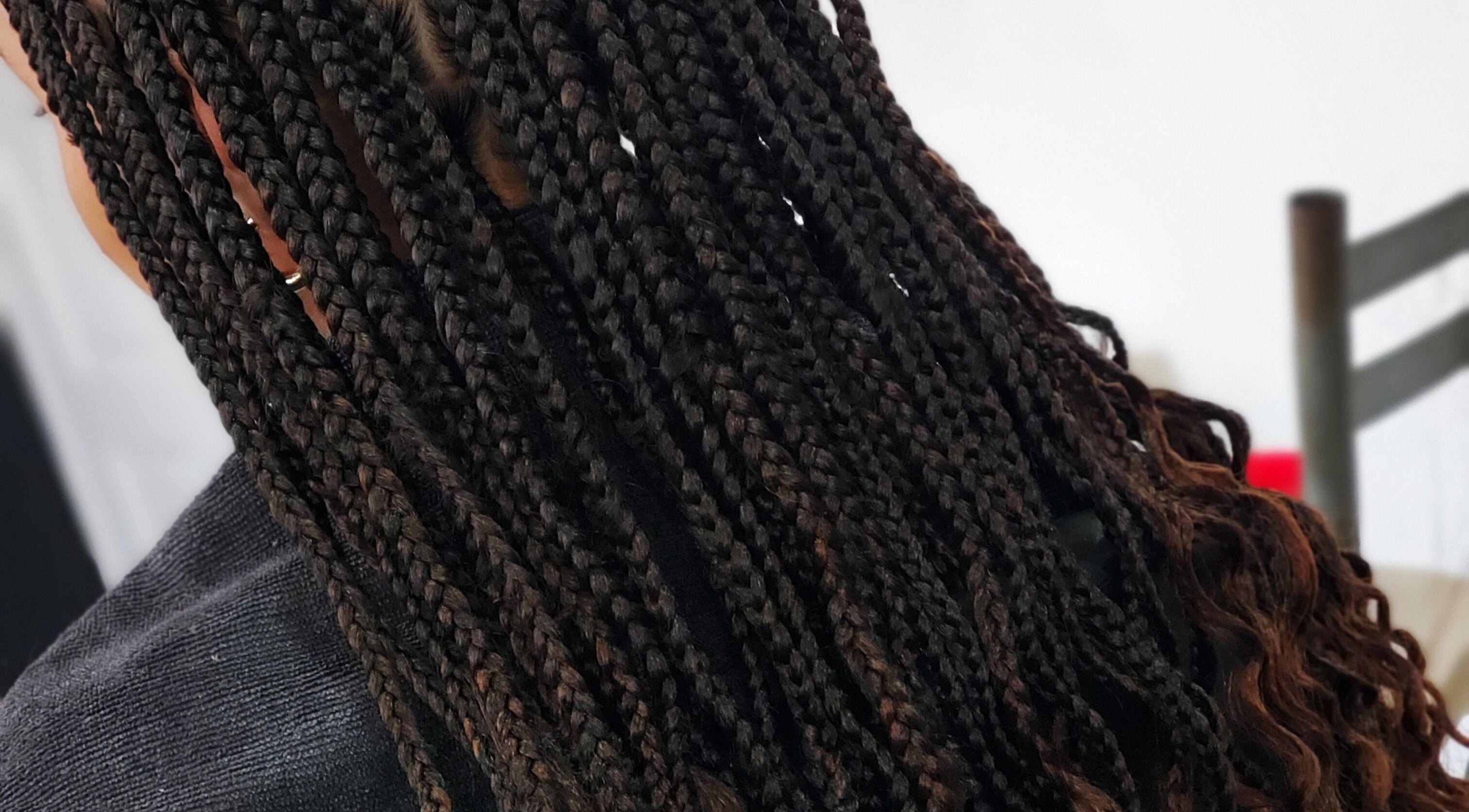 Intricate braids hairstyle at The Finished Look Castries, located in Castries, St.Lucia, JM.