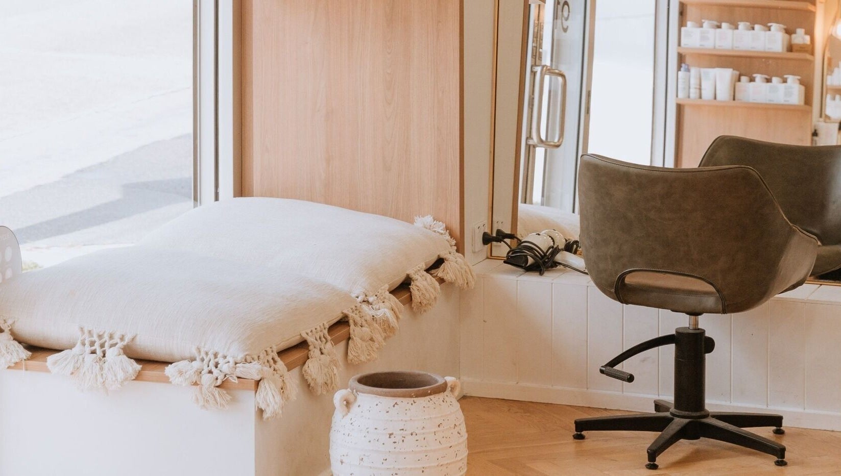Relaxing salon interior at Beauty and The Fox, Merewether, New South Wales, AU, featuring modern chair and decor.