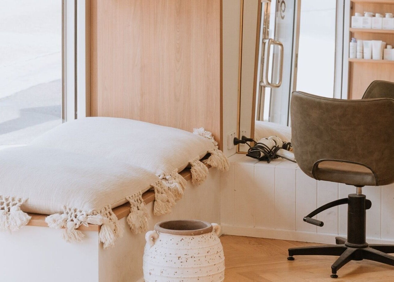 Relaxing salon interior at Beauty and The Fox, Merewether, New South Wales, AU, featuring modern chair and decor.