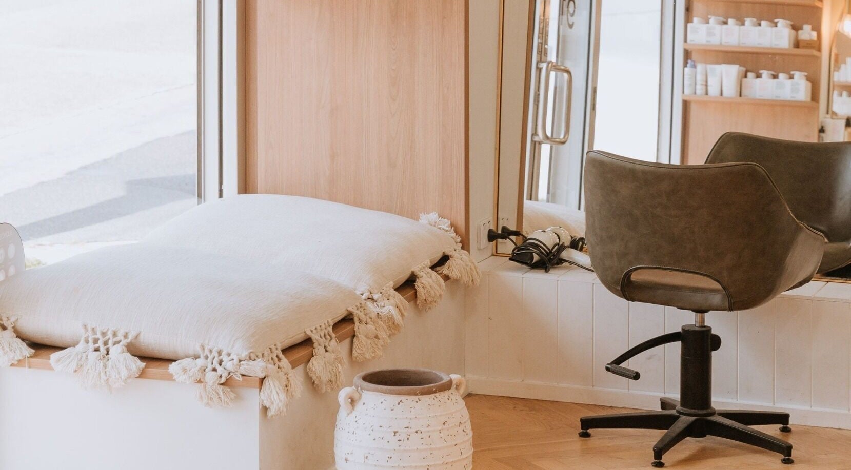Relaxing salon interior at Beauty and The Fox, Merewether, New South Wales, AU, featuring modern chair and decor.