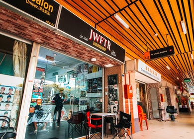 Front view of JWFTR salon in Singapore, SG, showcasing modern decor and inviting atmosphere.
