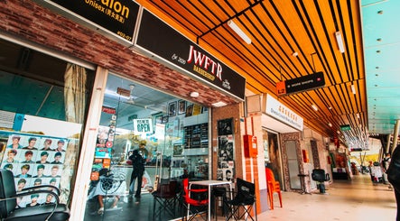 Front view of JWFTR salon in Singapore, SG, showcasing modern decor and inviting atmosphere.
