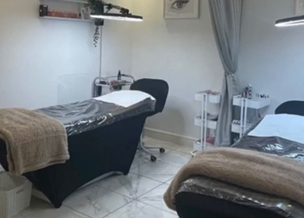 Serenity Aesthetic Clinic treatment room in Kempston, England, GB, featuring two treatment beds.