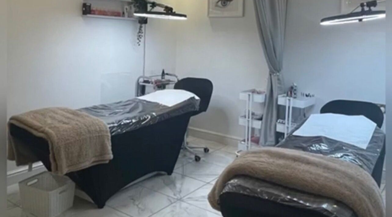 Serenity Aesthetic Clinic treatment room in Kempston, England, GB, featuring two treatment beds.