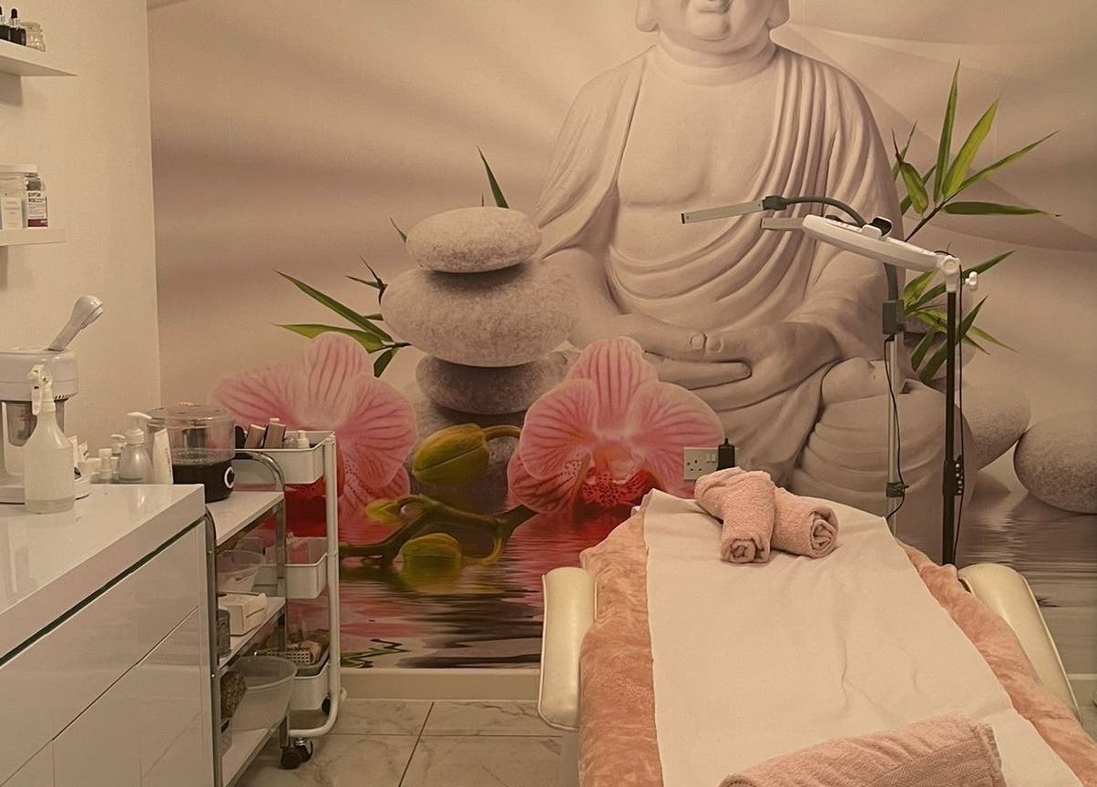 Relaxing treatment room at Serenity Aesthetic Clinic in Kempston, England, GB, featuring tranquil decor and equipment.