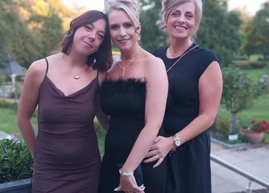 Group of women in elegant dresses at Mirror Mirror Hair Studio, Malmesbury, England, GB.