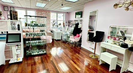 Interior of Millennium Beauty Studio with chic decor in New York, New York, US showcasing beauty services area.