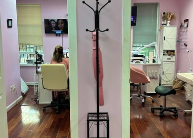 Millennium Beauty Studio interior with pink decor, welcoming customers in New York, New York, US.