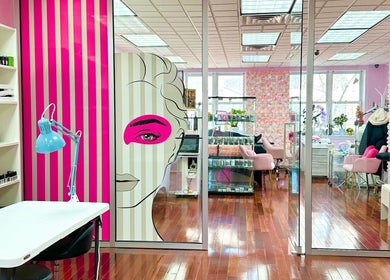 Stylish interior of Millennium Beauty Studio in New York, New York, US with vibrant decor and beauty stations.