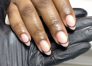 Manicure with elegant nail art at Beck the Nail Teck, Dartford, GB. Soft pink polish with black lines.