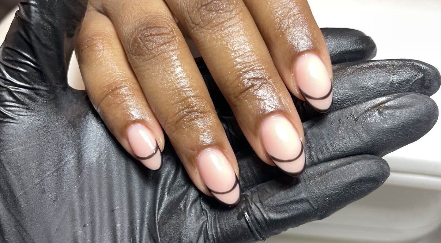 Stylish manicure with pink and black at Beck the Nail Teck, Dartford, GB. Perfect blend of elegance and fashion.