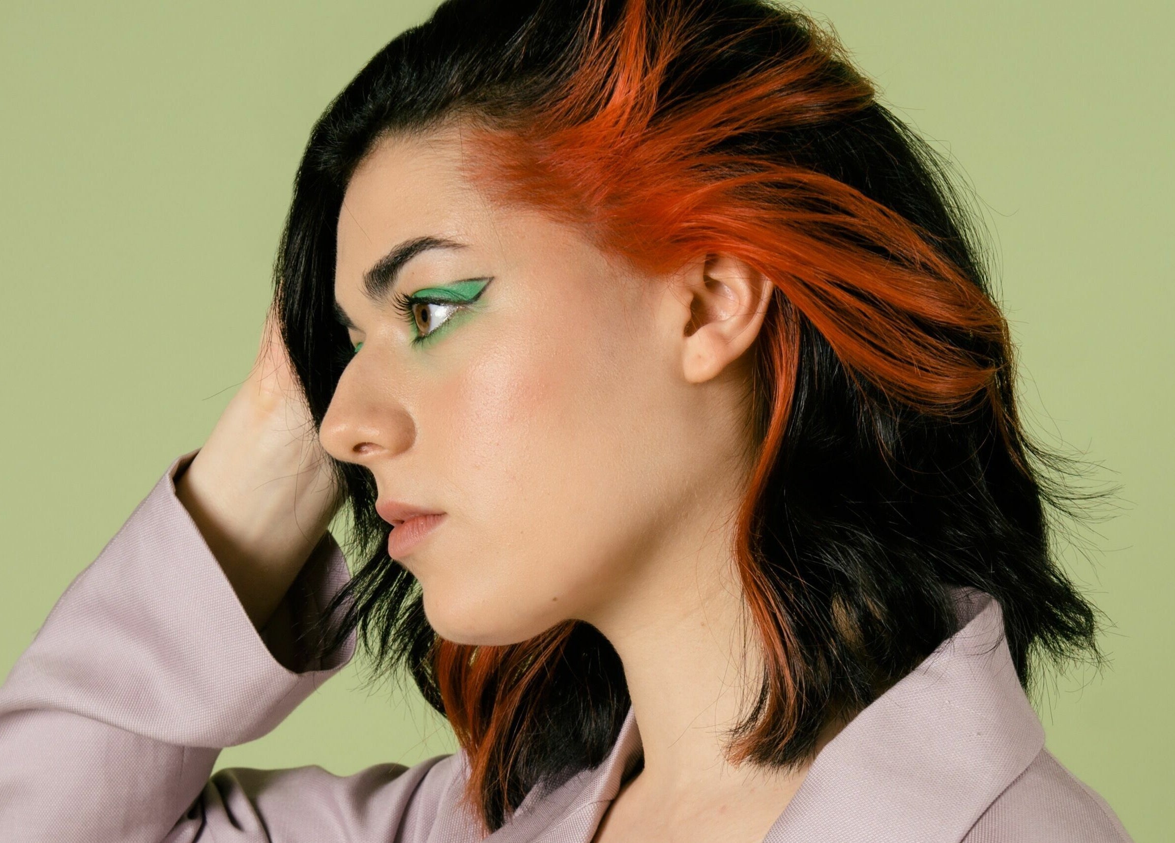Bold hairstyle with orange highlights at Marc-Antoine Hairstudio Gallery, Berlin, Berlin, DE.