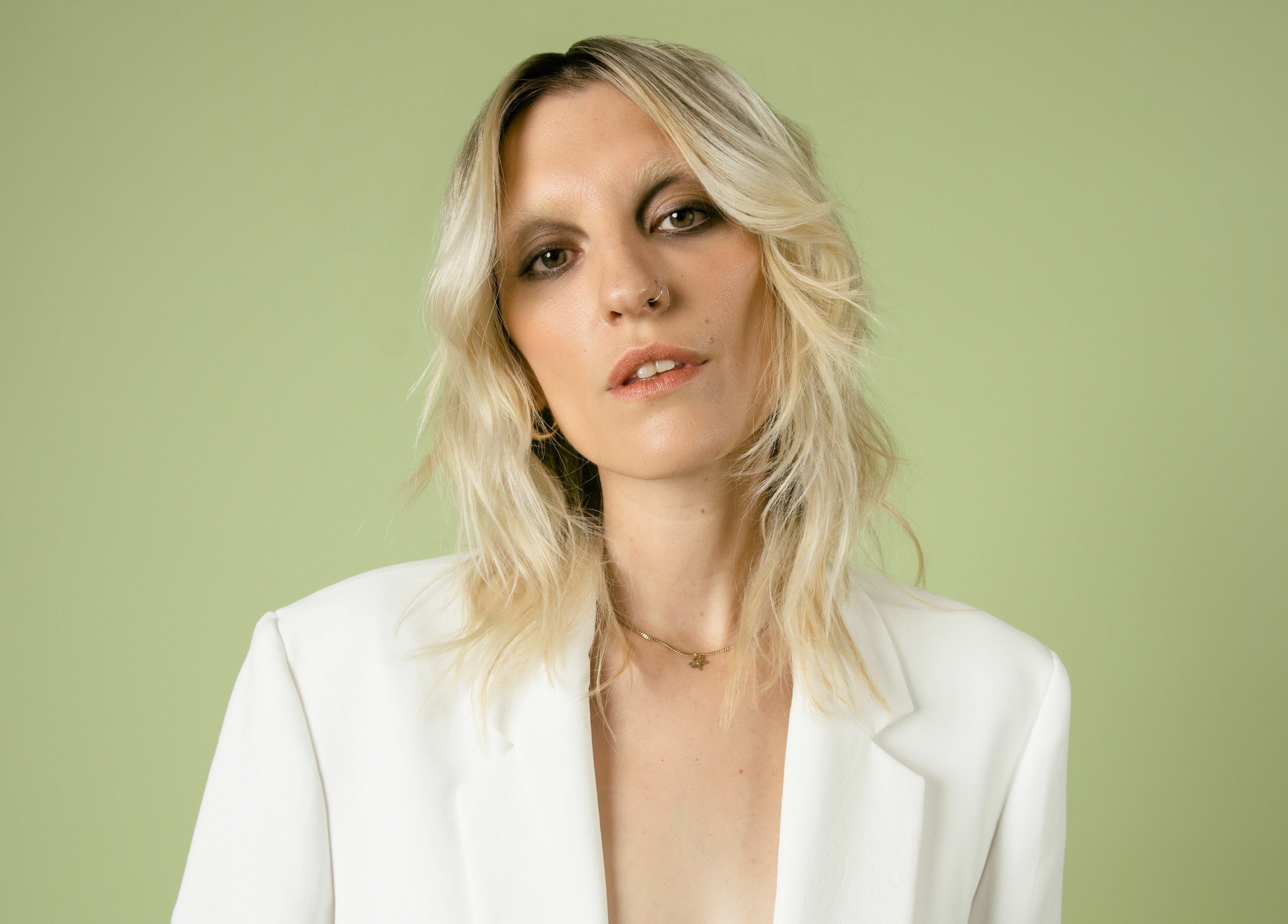 Woman with wavy blonde hair, styled at Marc-Antoine Hairstudio Gallery, Berlin, Berlin, DE.