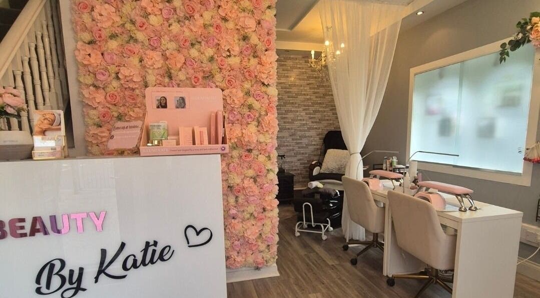 Beauty and Body By Katie in Castleisland, County Kerry, IE showcases a floral wall and modern salon seating.
