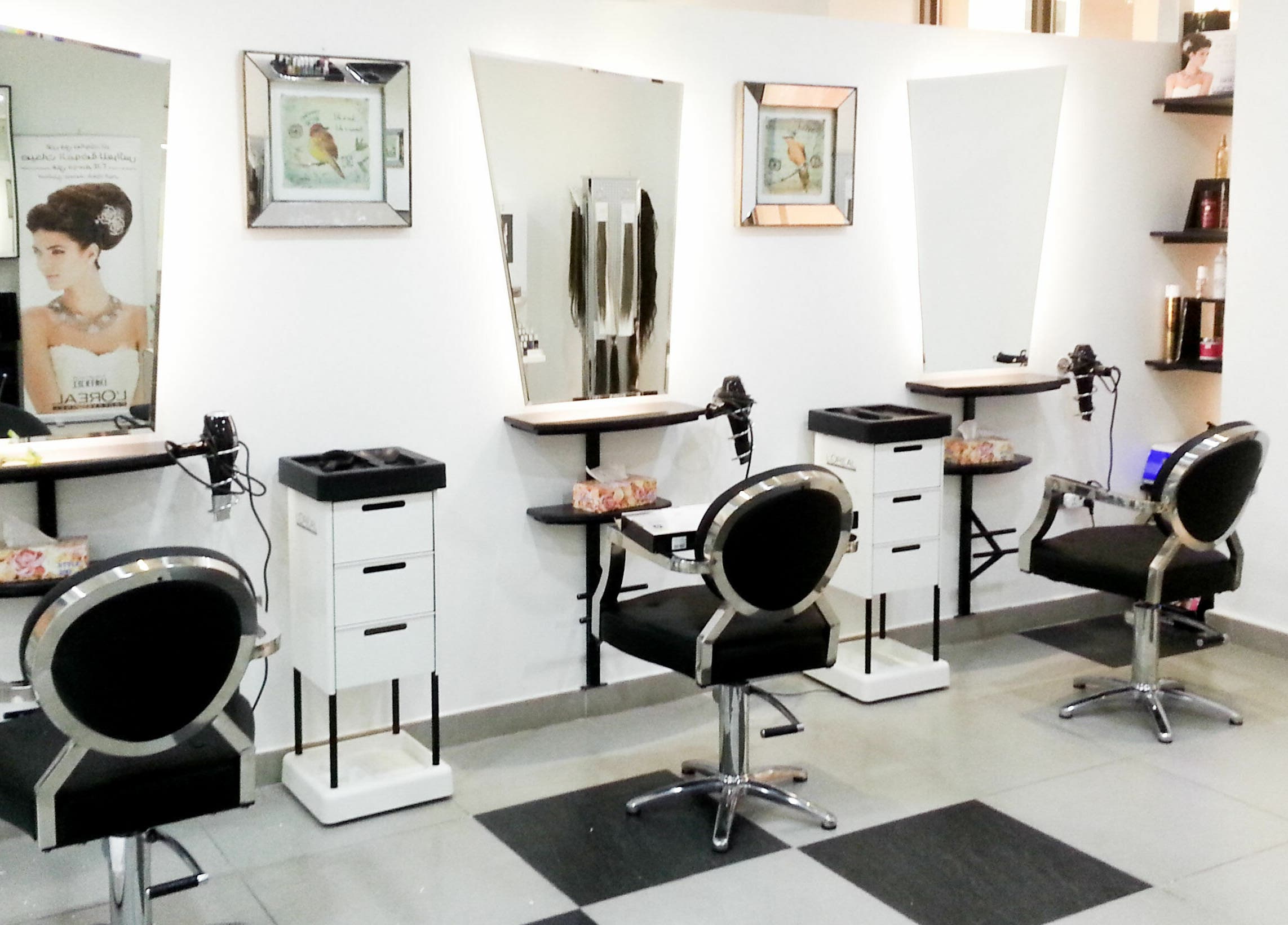 Chic styling stations at MOI Beauty Salon - Ramada Hotel, Dubai, Dubai, AE offering luxury beauty services.