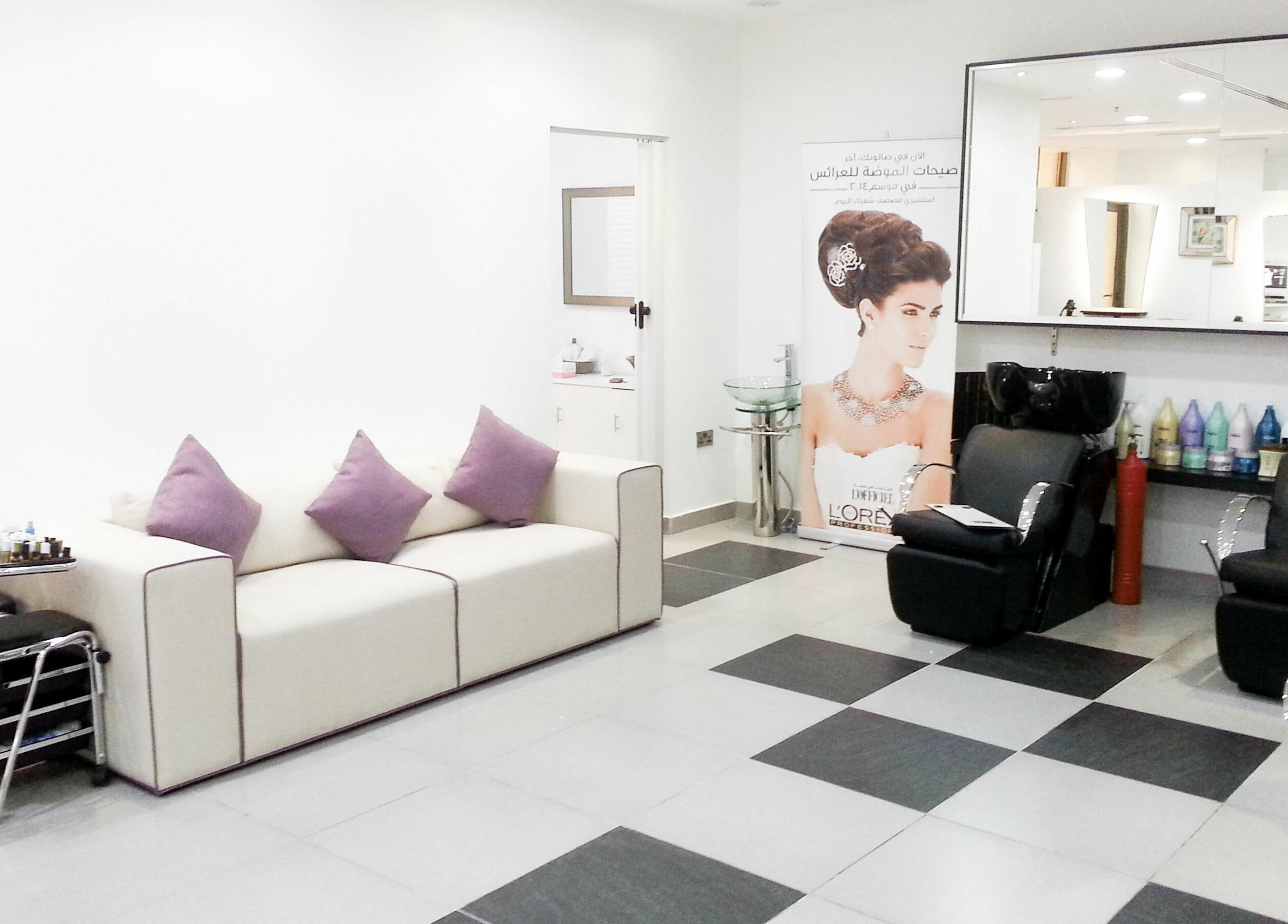 Stylish interior of MOI Beauty Salon - Ramada Hotel in Dubai, Dubai, AE with plush seating and modern decor.