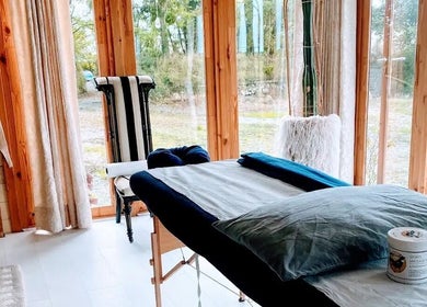 Bright massage room at Mobile Massage Pembrokeshire in Haverfordwest, Wales, GB, showcasing relaxation and tranquility.