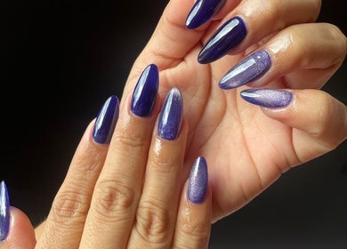 Purple manicured nails at Glam Express Cordillera in Santa Catarina, Nuevo León, MX displaying stylish elegance.