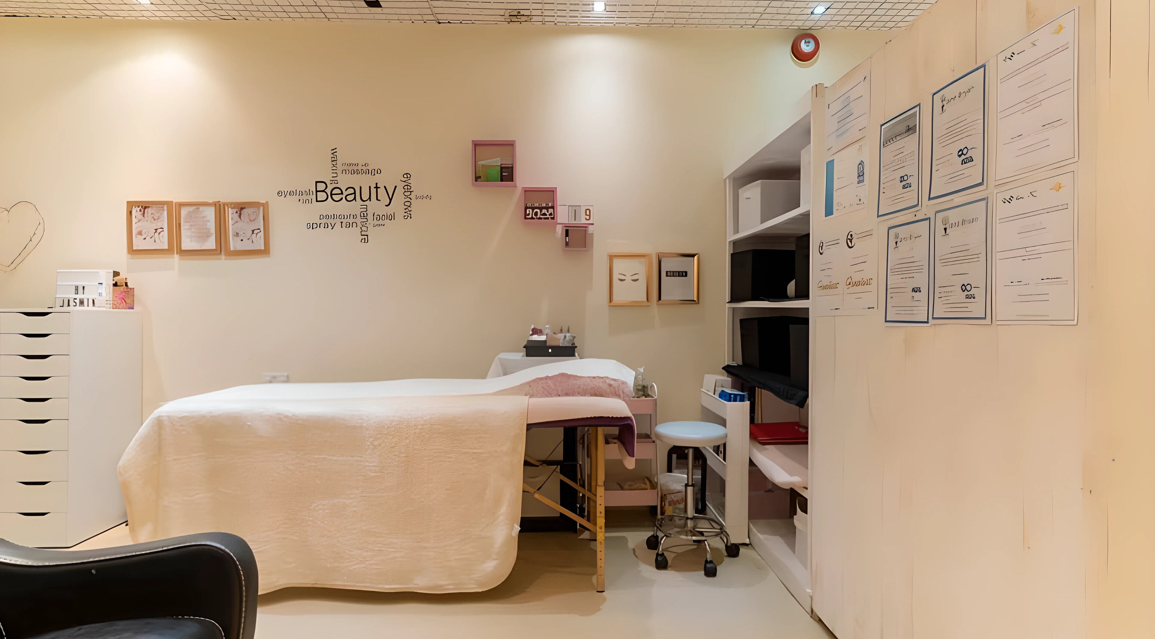 Calm treatment room at Pampered Retreat, showcasing a massage table and decor in Bangor, Wales, GB.