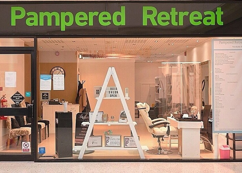 Front view of Pampered Retreat salon in Bangor, Wales, showcasing a cozy and inviting atmosphere.