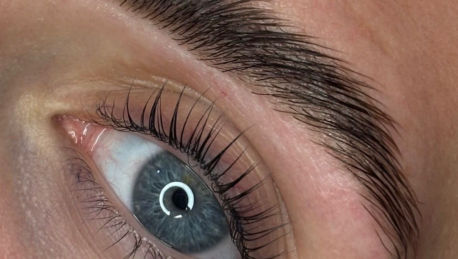 Close-up of a perfectly styled eyebrow and lashes at The Bloom Studio, Colchester, England, GB.