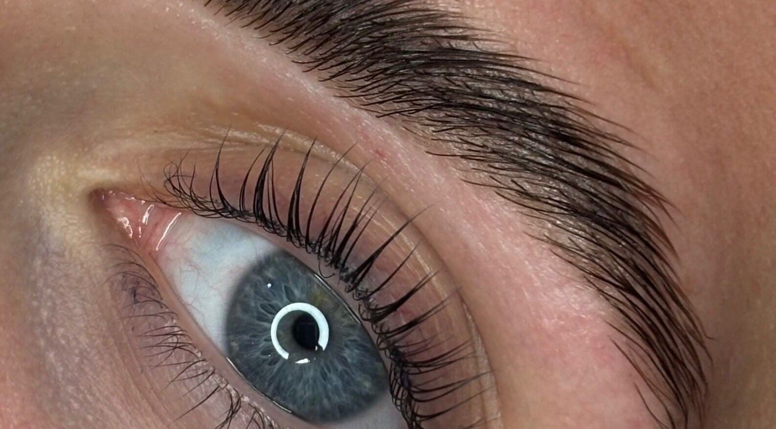 Close-up of a perfectly styled eyebrow and lashes at The Bloom Studio, Colchester, England, GB.