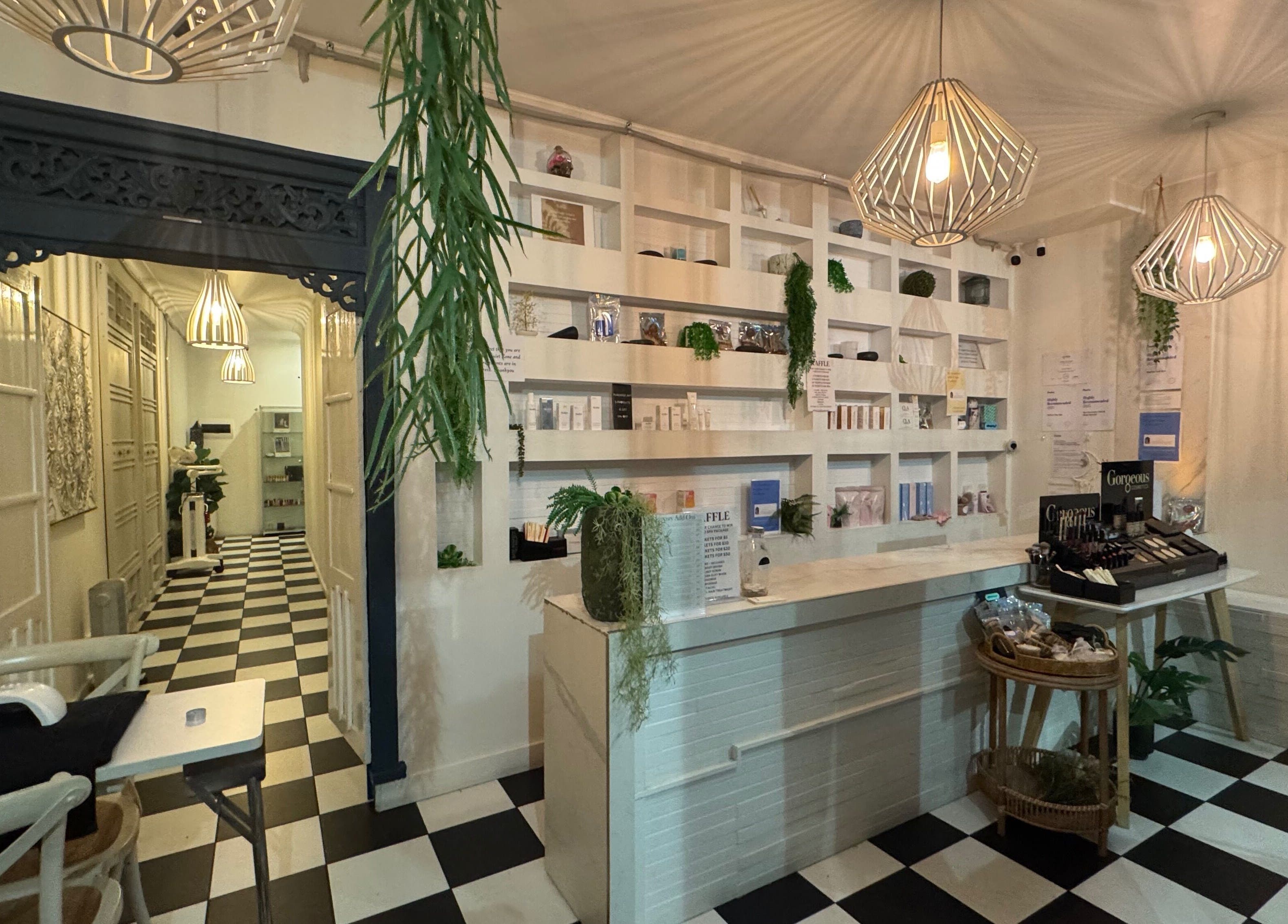 Elegant reception at Spa Semiyahn Skin + Body Retreat in Port Kembla, New South Wales, AU features chic decor.