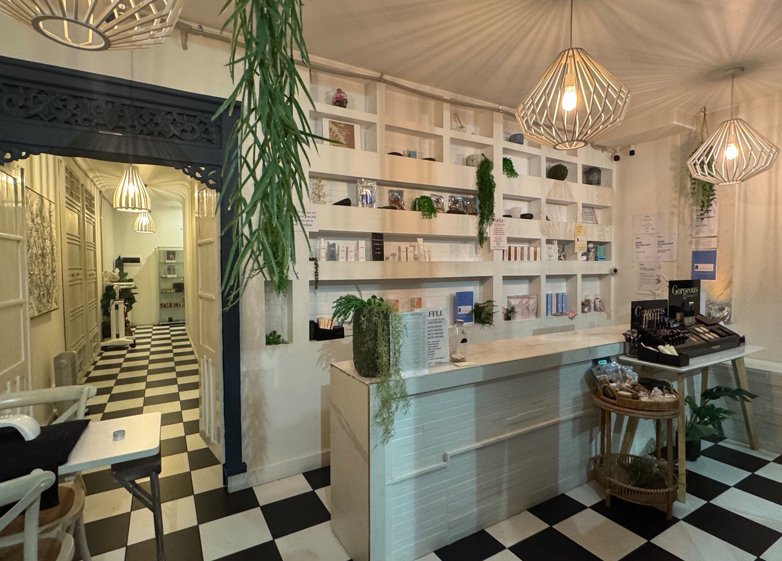 Elegant reception at Spa Semiyahn Skin + Body Retreat in Port Kembla, New South Wales, AU features chic decor.