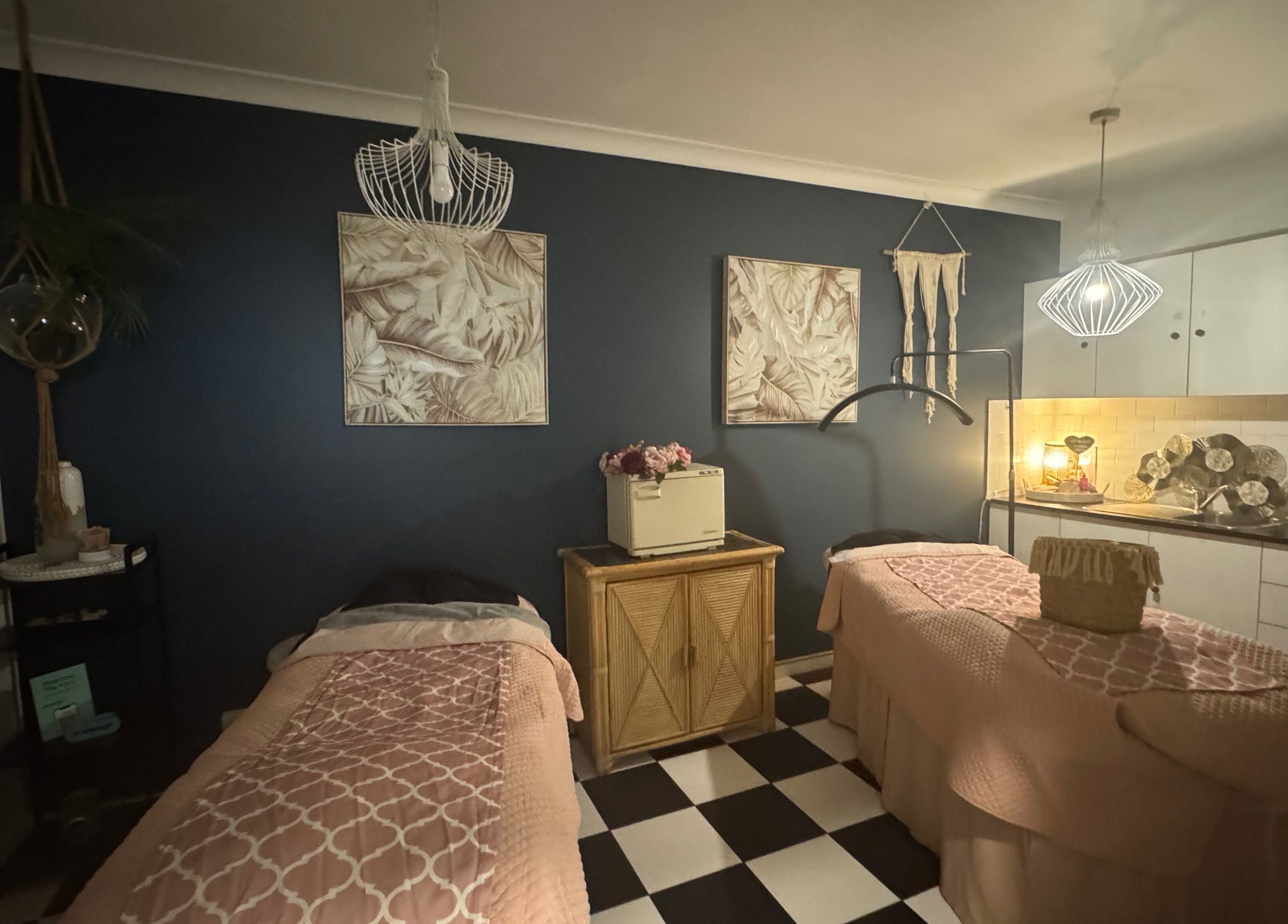 Tranquil massage room at Spa Semiyahn Skin + Body Retreat, Port Kembla, New South Wales, AU with elegant decor.