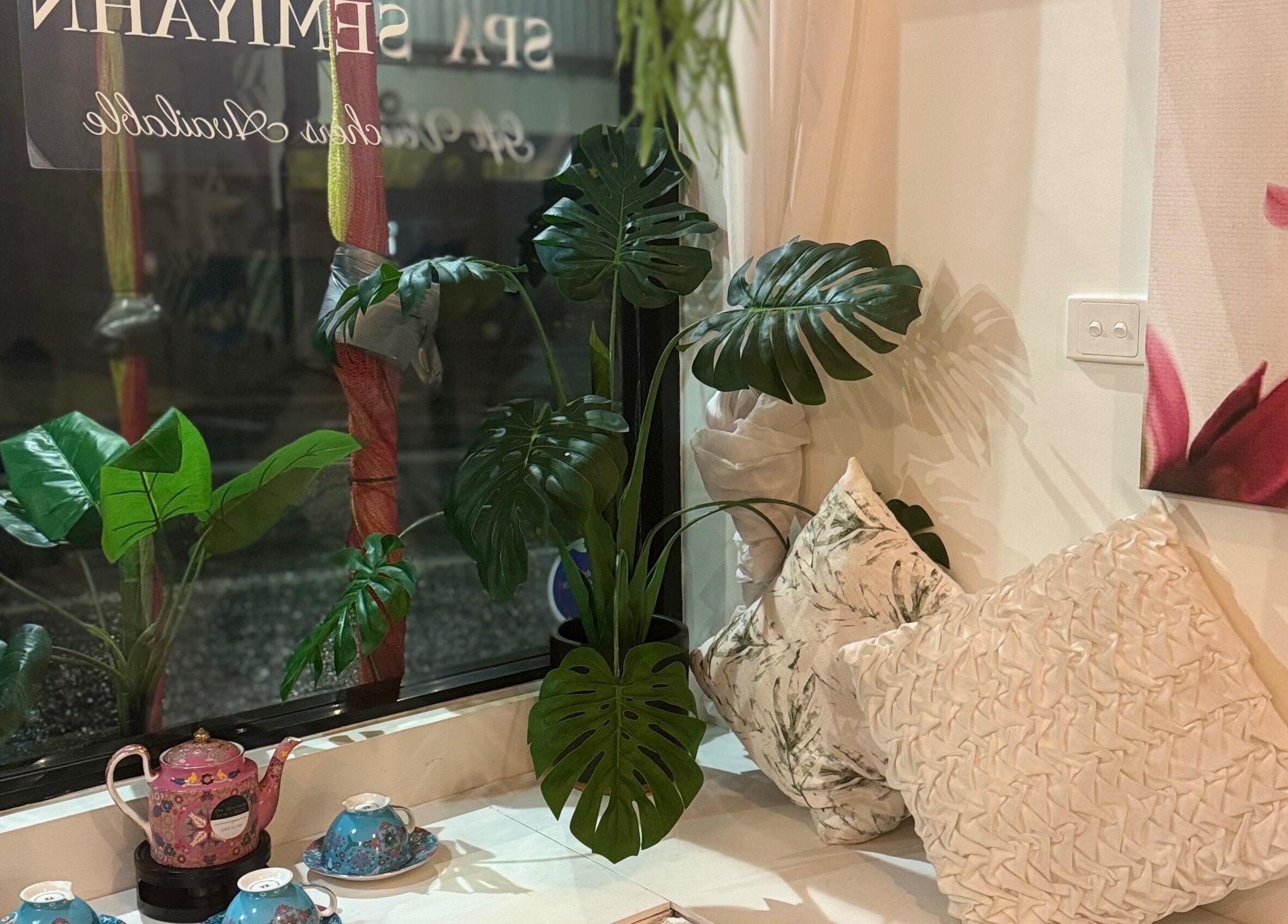 Cozy corner with plants and teapot at Spa Semiyahn Skin + Body Retreat, Port Kembla, New South Wales, AU.