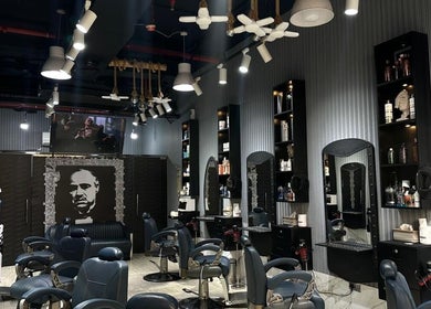 Modern interior of Milado Cut Barber Shop in Dubai, Dubai, AE with sleek barber chairs and stylish decor.