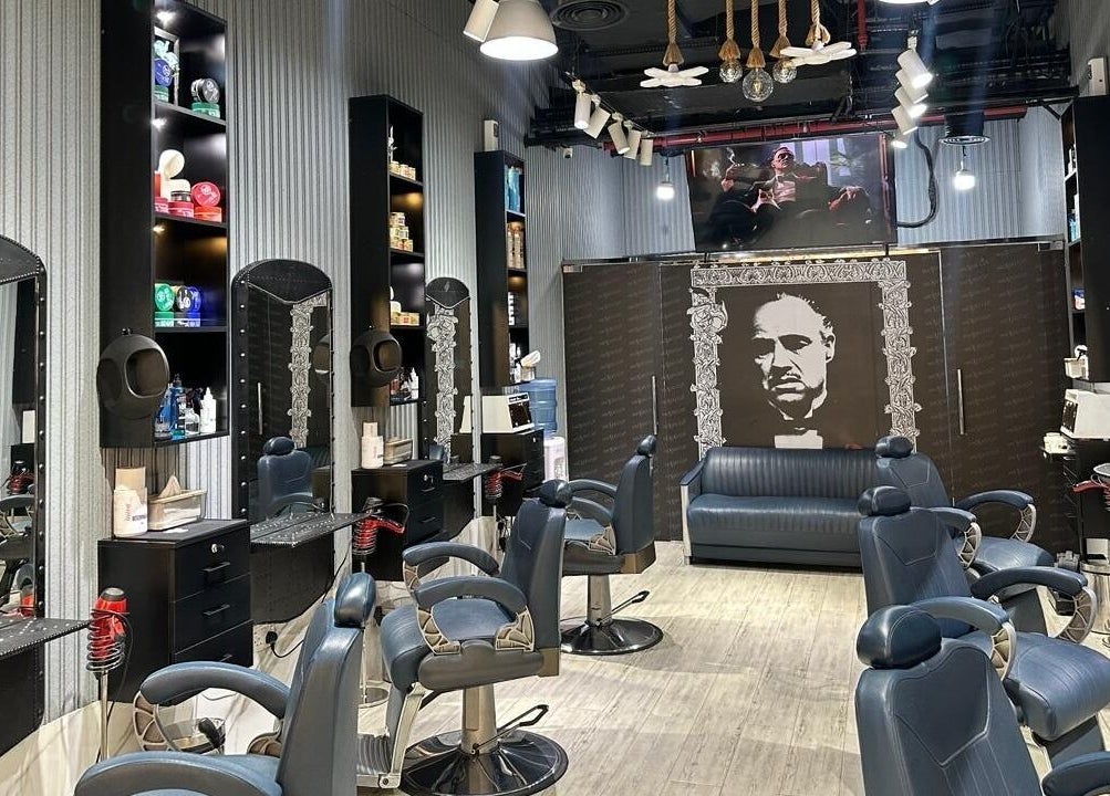 Sleek interior of Milado Cut Barber Shop, Dubai, Dubai, AE, showcasing stylish barber chairs and elegant decor.