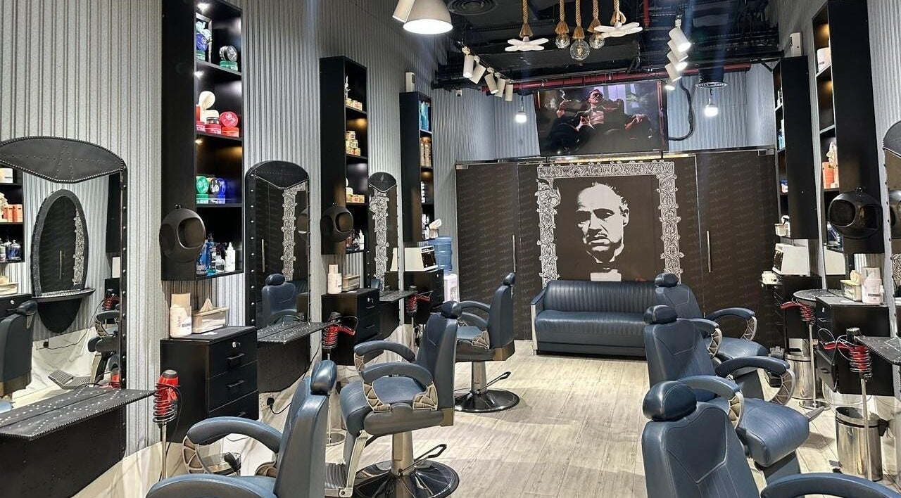 Sleek interior of Milado Cut Barber Shop, Dubai, Dubai, AE, showcasing stylish barber chairs and elegant decor.
