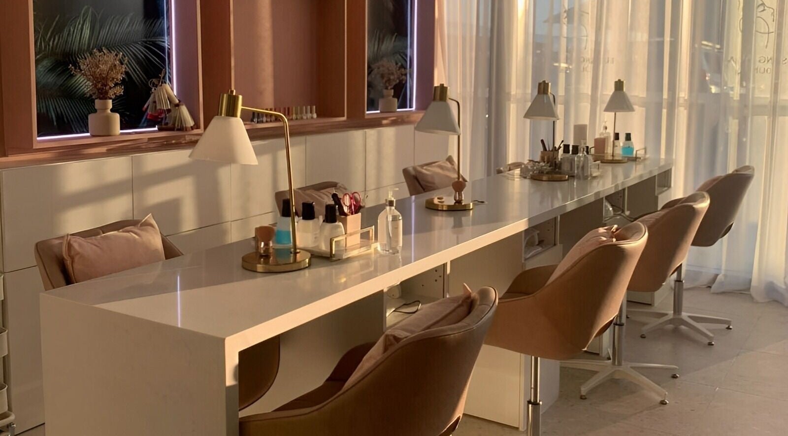 Chic beauty station at Blushing Beauty Lounge x Scalp Spa Perth, Brabham, Western Australia, AU with soft lighting.