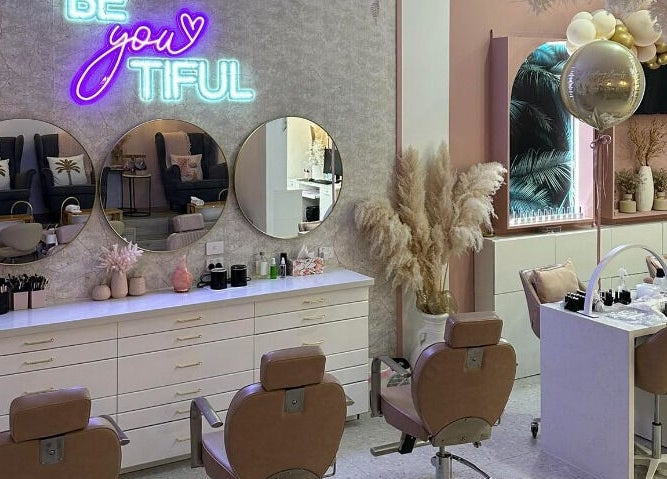 Interior of Blushing Beauty Lounge x Scalp Spa Perth in Brabham, Western Australia, AU, featuring elegant beauty chairs.