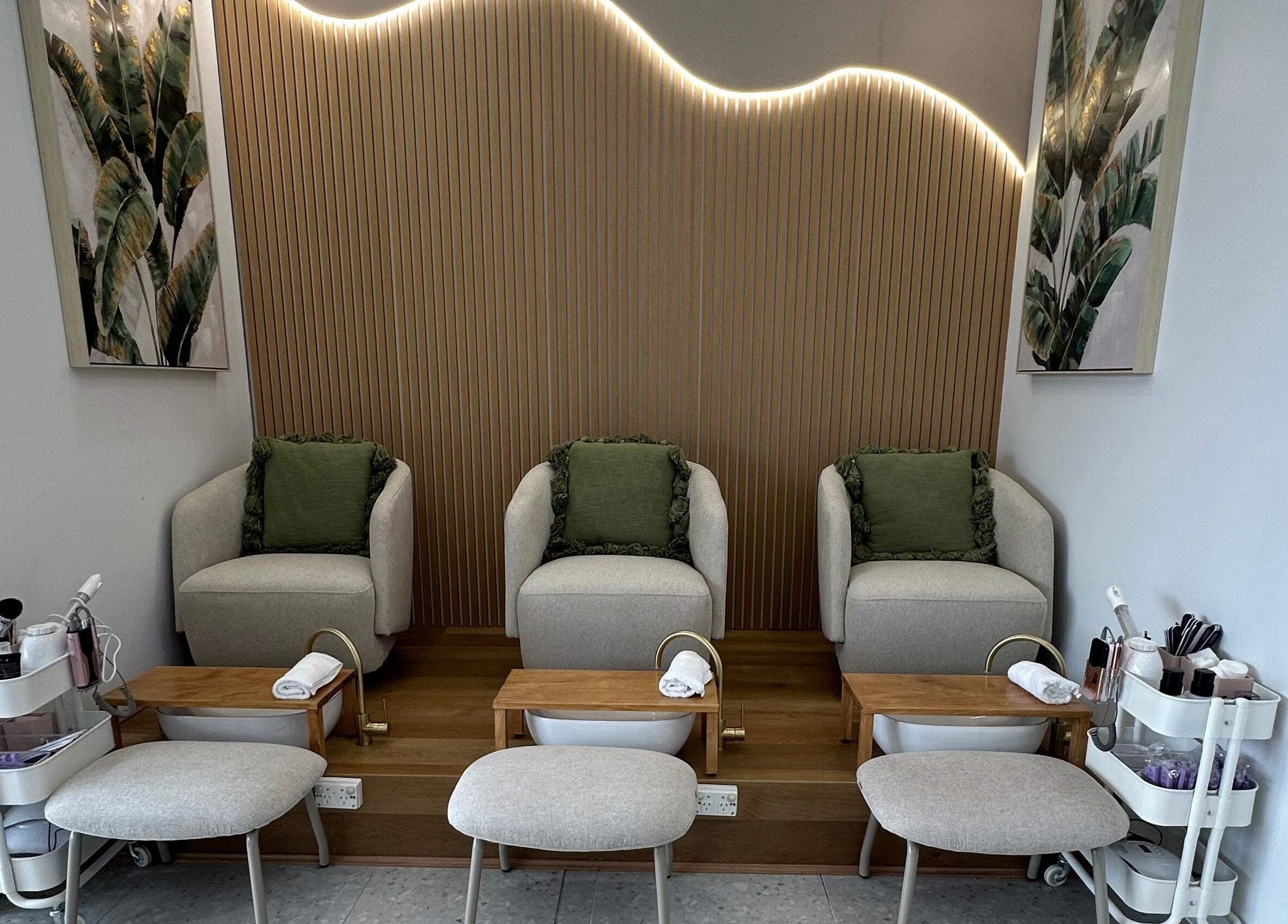 Pedicure area at Blushing Beauty Lounge x Scalp Spa Perth in Brabham, Western Australia, AU with plush chairs.