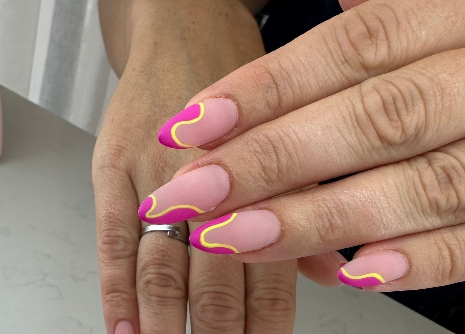 Stylish pink and yellow nail art at Blushing Beauty Lounge x Scalp Spa Perth, Brabham, Western Australia, AU.