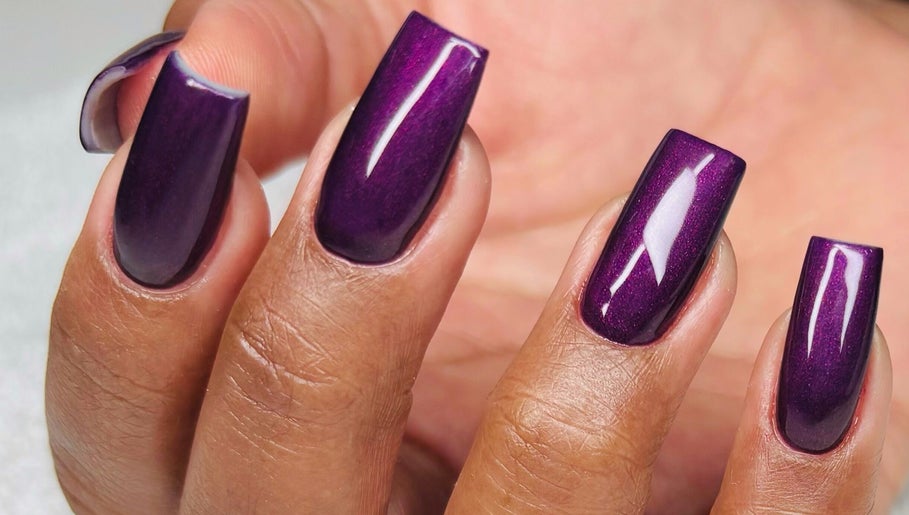 Elegant purple manicure at Myrie Beauty, Whitby, Ontario, CA offering luxurious nail services.