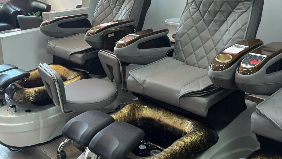 Elegant pedicure chairs at Myrie Beauty, Whitby, Ontario, CA offering a luxurious spa experience.