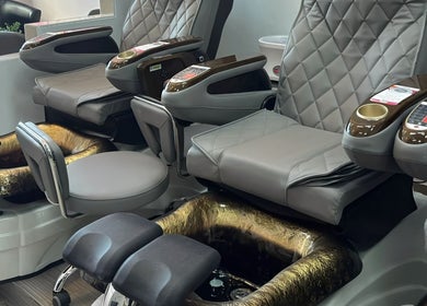 Elegant pedicure chairs at Myrie Beauty, Whitby, Ontario, CA offering a luxurious spa experience.