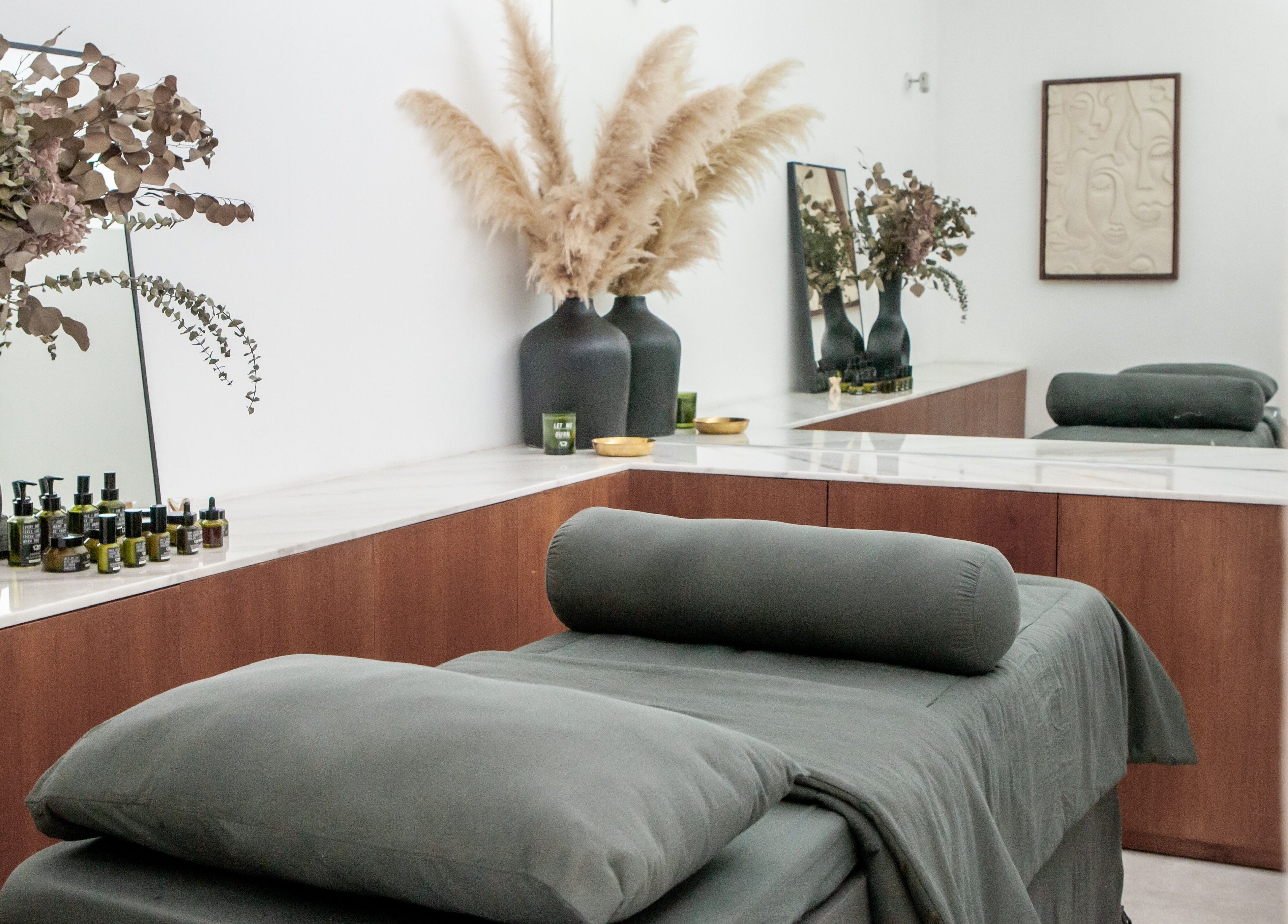 Relaxing massage room at Fields of Yarrow Berawa in Bali, Bali, ID with cozy décor and essential oils.