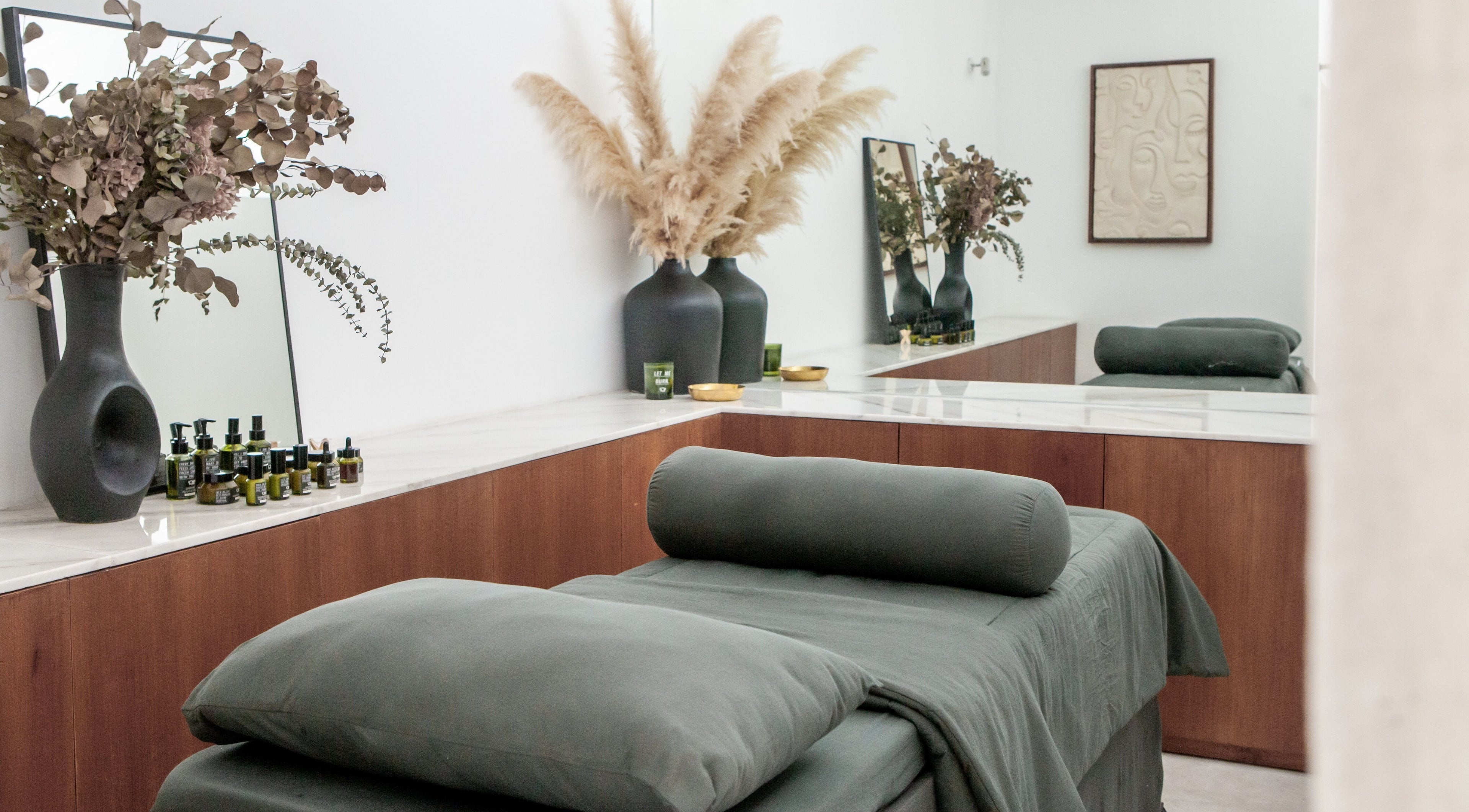 Relaxing massage room at Fields of Yarrow Berawa in Bali, Bali, ID with cozy décor and essential oils.