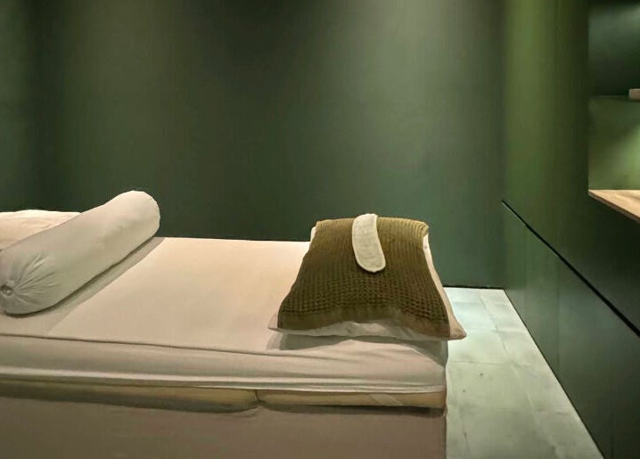 Relaxing massage room at Fields of Yarrow Uluwatu, Bali, Bali, ID featuring cozy bed and soothing ambiance.