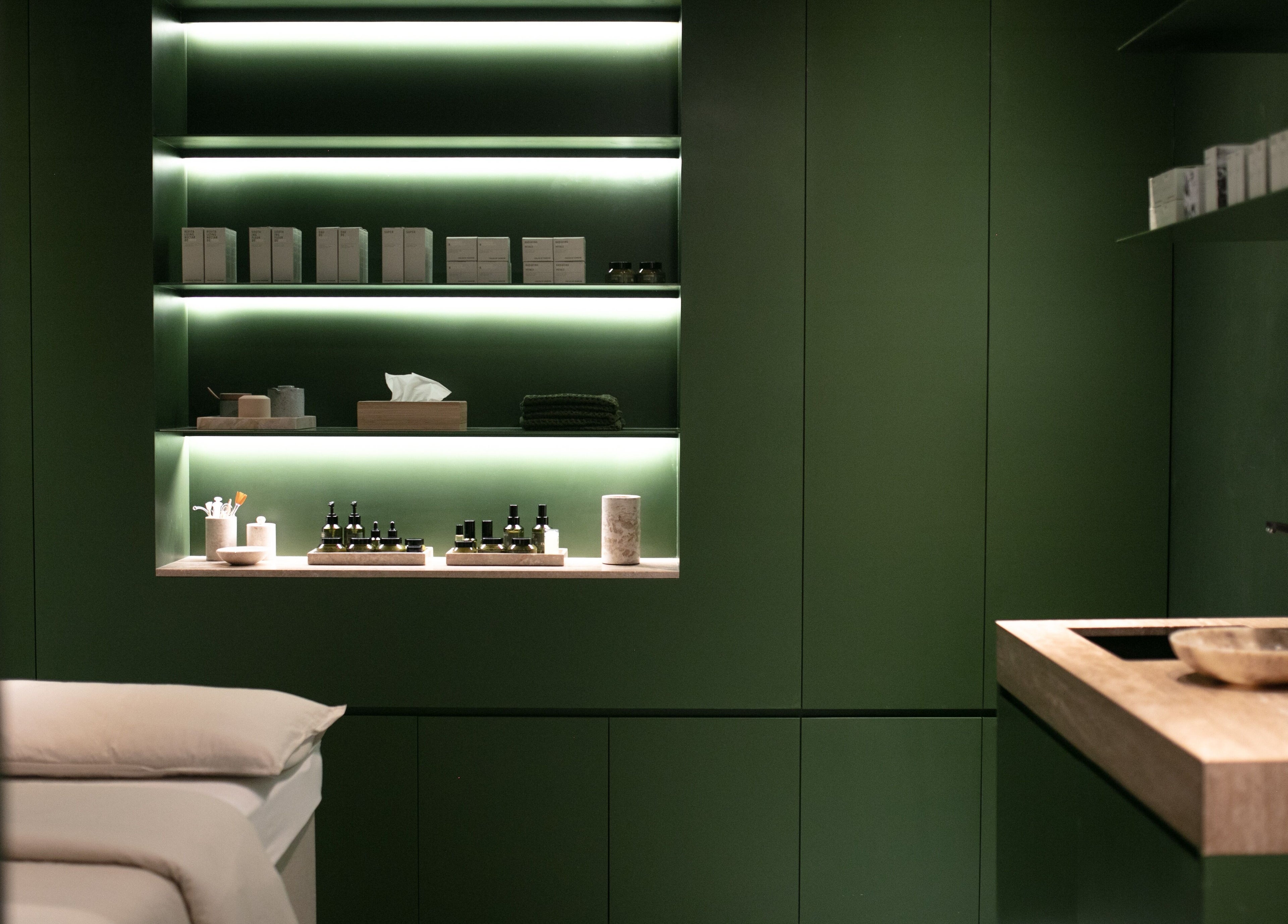 Luxurious spa room at Fields of Yarrow Uluwatu, Bali, Bali, ID with a modern green design.