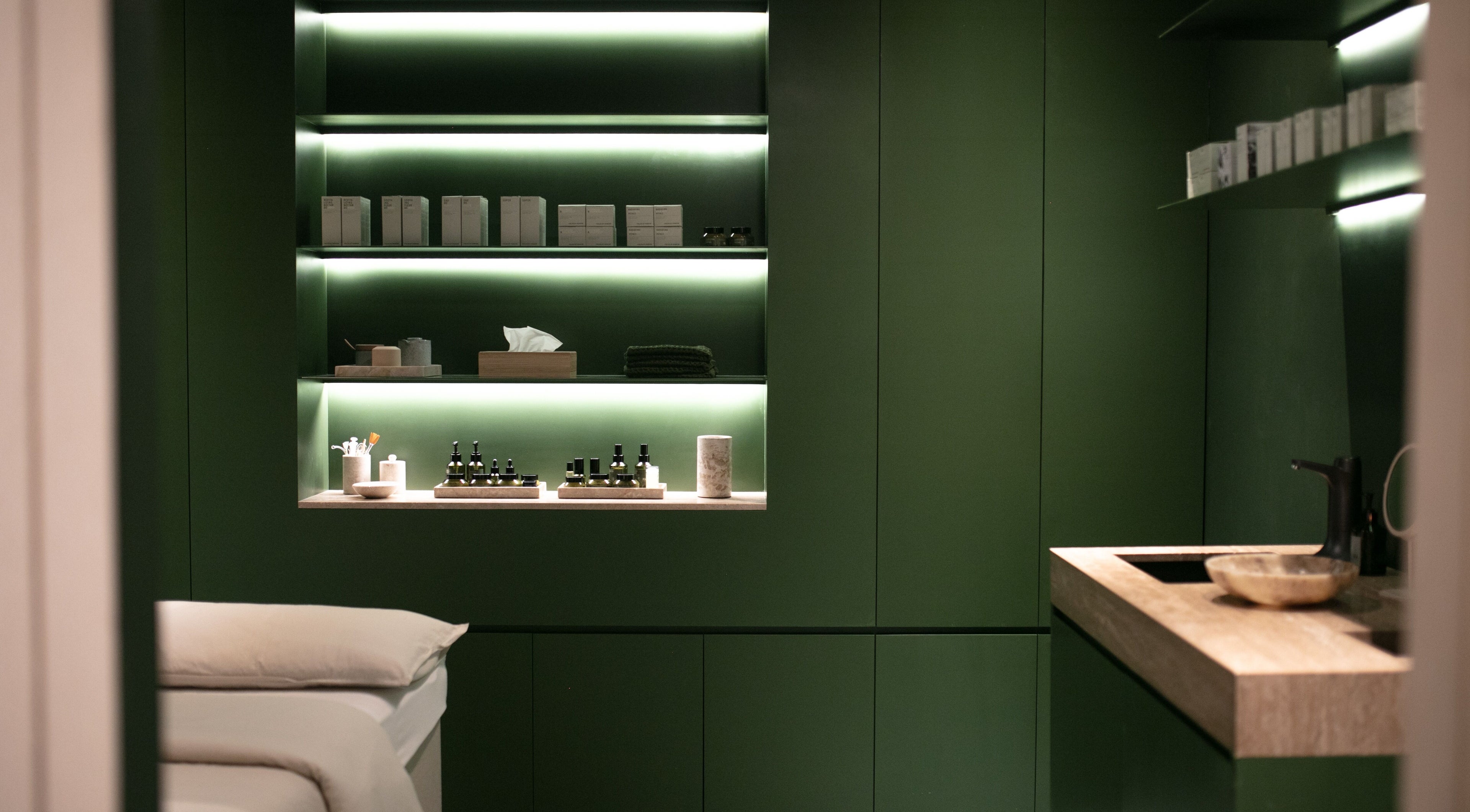 Luxurious spa room at Fields of Yarrow Uluwatu, Bali, Bali, ID with a modern green design.