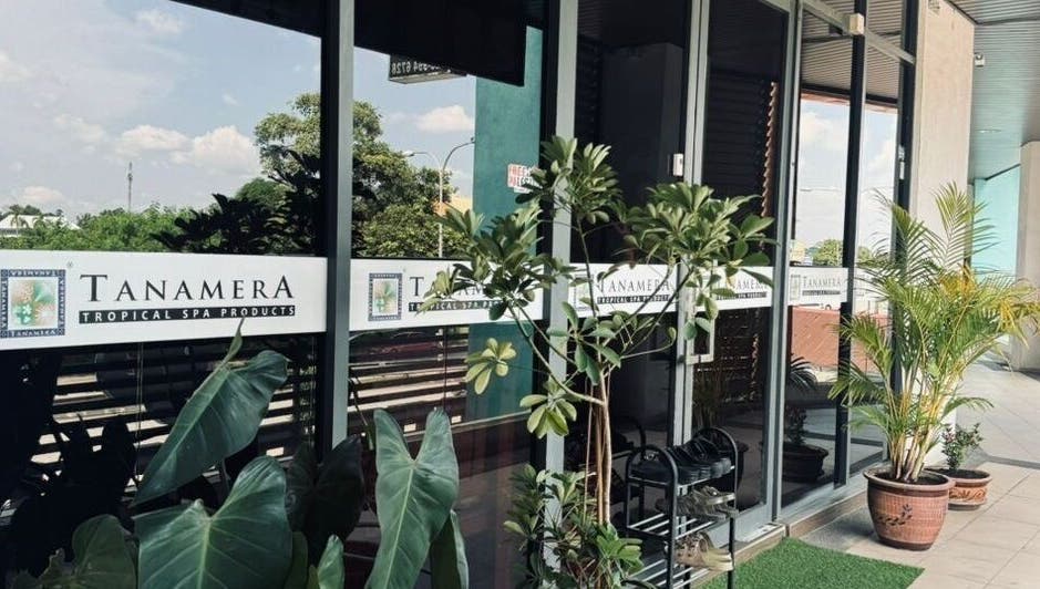 Entrance of Tanamera Spa Kemaman Arked in Chukai, Terengganu, MY with tropical plants and glass doors.
