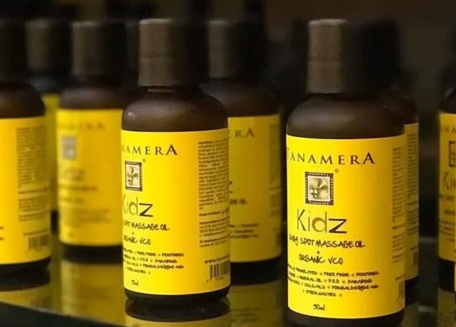 Display of Tanamera Spa Kemaman Arked massage oil bottles in Chukai, Terengganu, MY with vibrant labels.