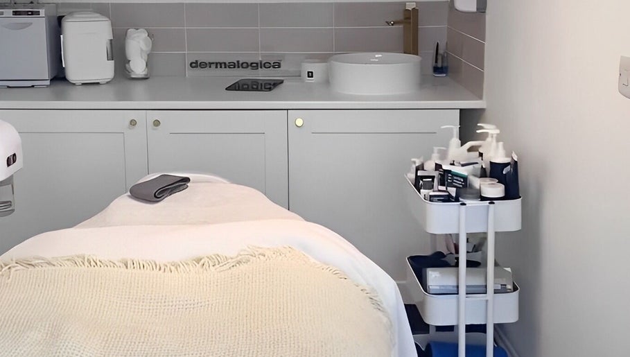Treatment room at Radiance Aesthetics Skin Clinic, Portsmouth, England, GB with modern decor and skincare products.
